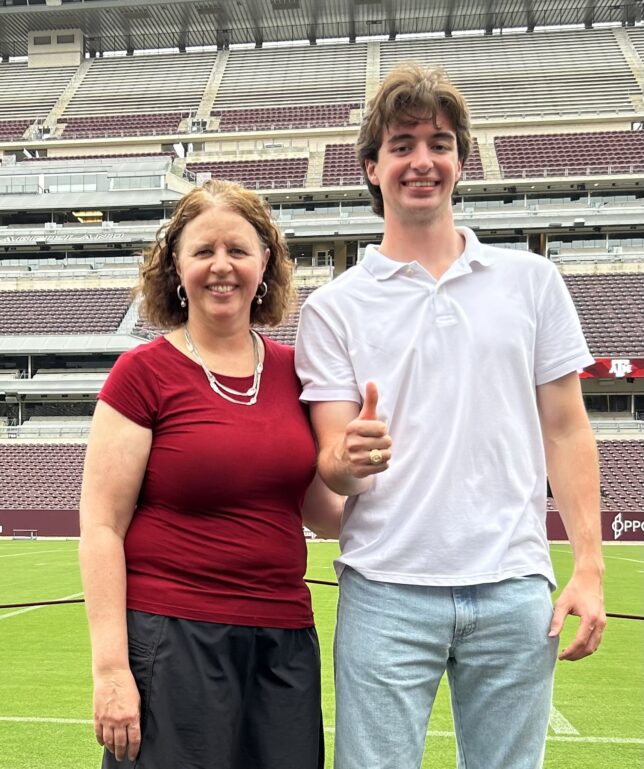 Beth Hunt with her Aggie son
