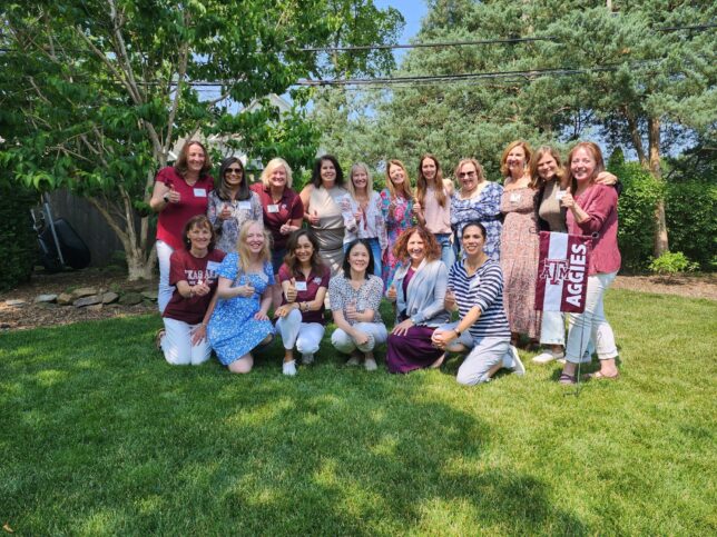 Chicago Area Aggie Moms gathered together at a club event.